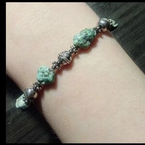 Sterling silver and turquoise bracelet with cross charm